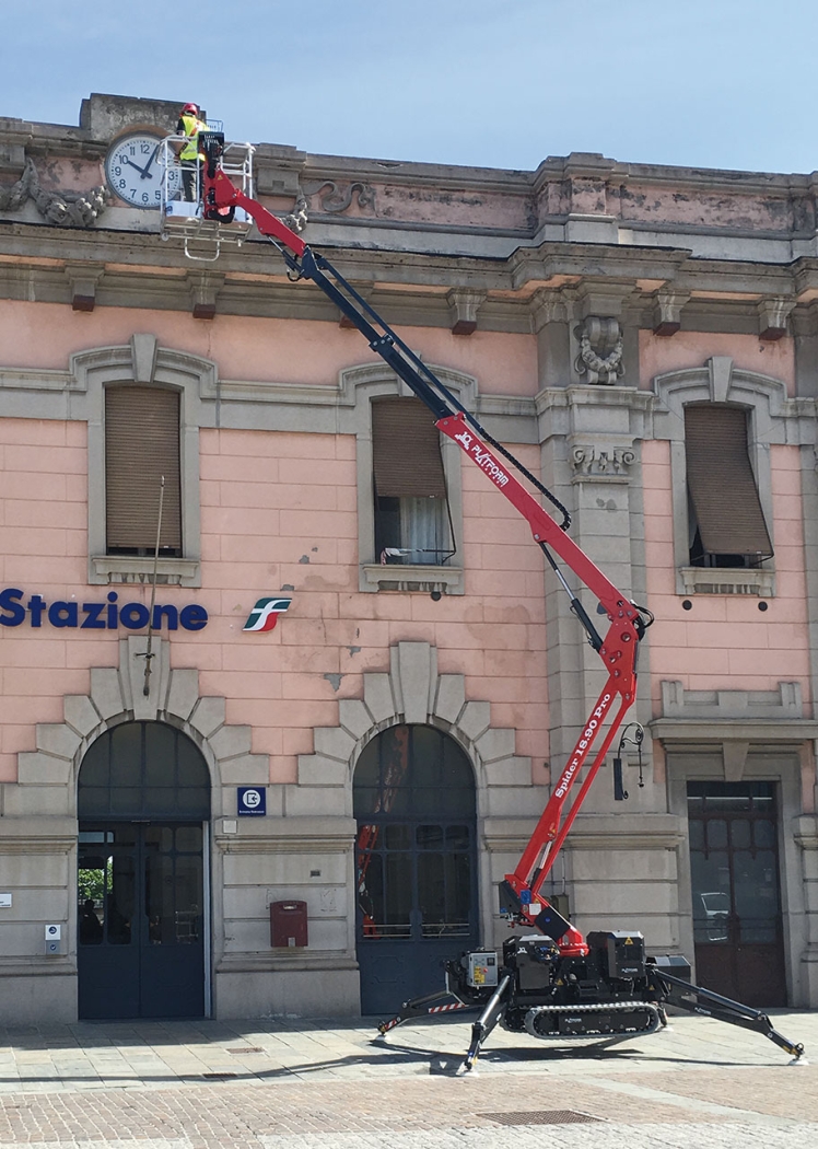 Spider lift working on the facade of a historic building