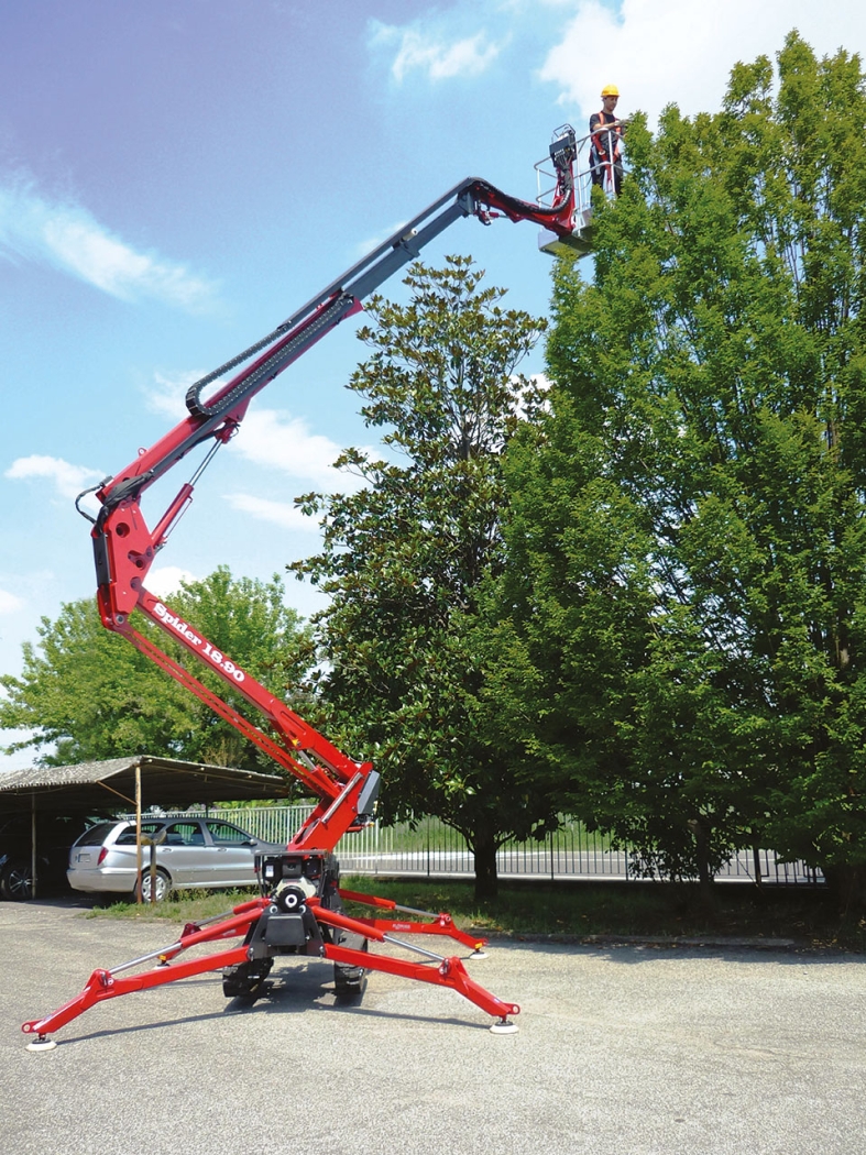 Spider lift positioned outside a residential building for maintenance