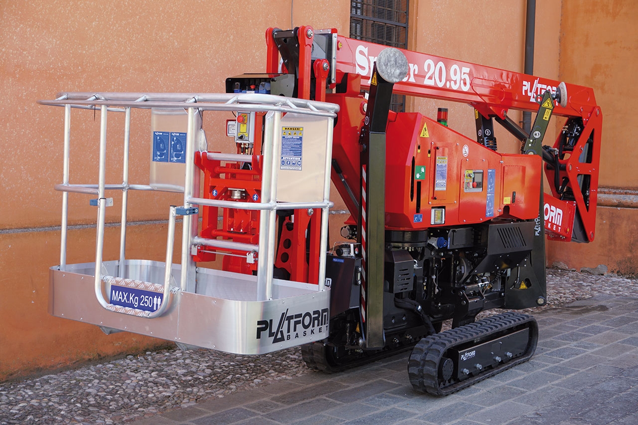 Tracked aerial lift with an operator basket