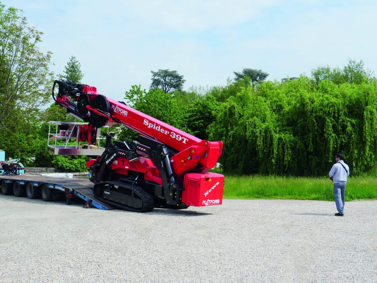 Tracked aerial platform for rugged terrain and precise positioning.